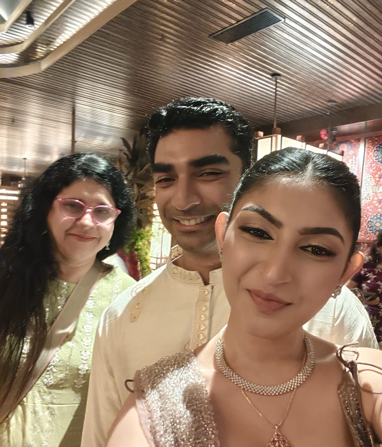 Second Couple celebrating with family at their wedding