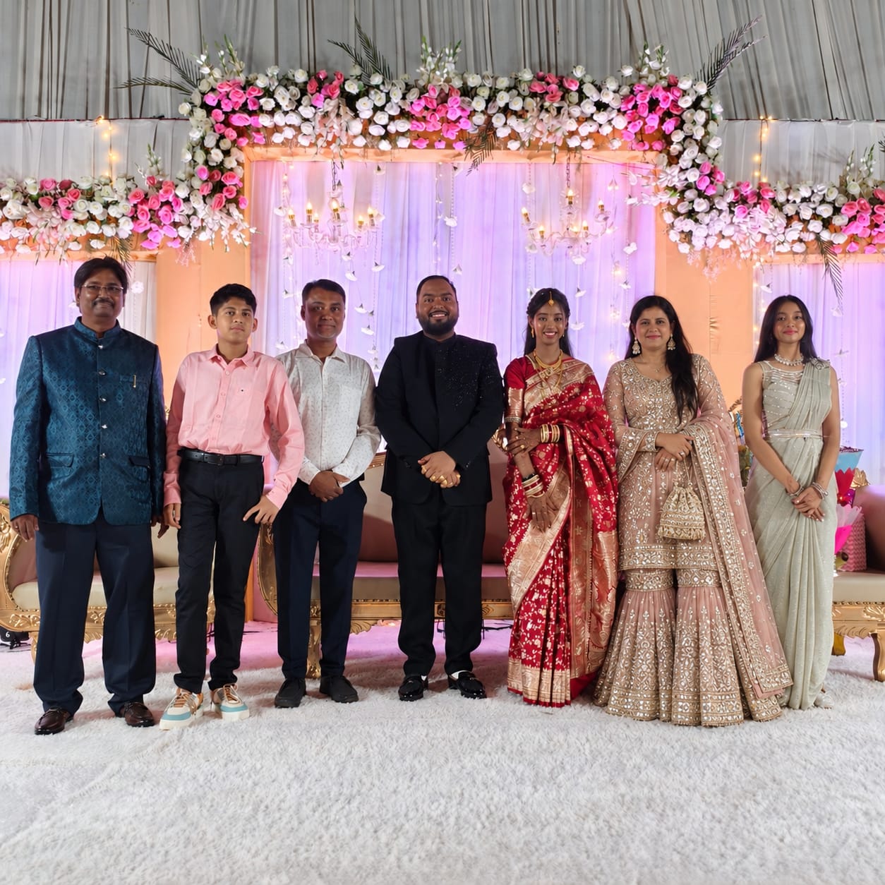 Second Couple celebrating with family at their wedding
